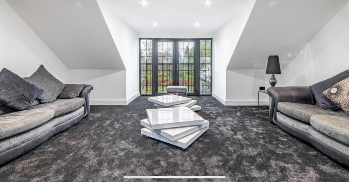 Converted attic living space with vaulted ceilings